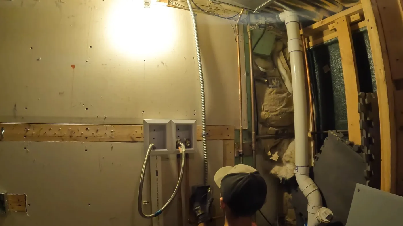 Exposed interior plumbing and pipe repair area for residential community in Avondale, AZ