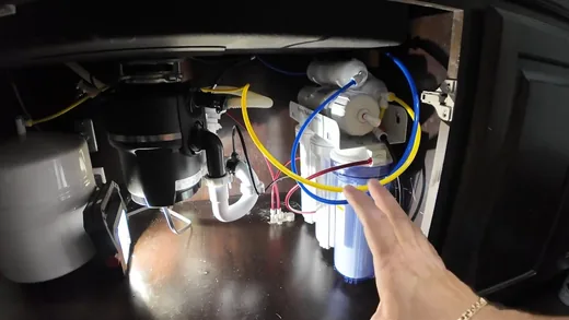 Garbage disposal under a kitchen sink showing desert detail for garbage disposal service in Buckeye, AZ