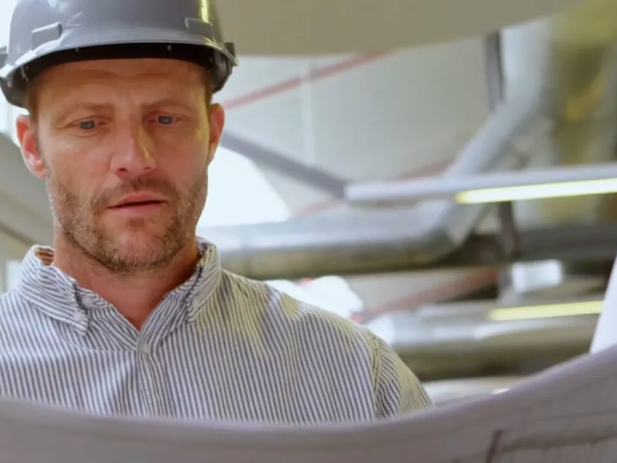 Licensed plumber reviewing a pipe drawing for burst pipe repair in Buckeye, AZ