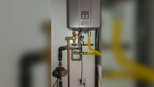 Water heater tank, piping, and service components used during residential community work near West Phoenix, AZ